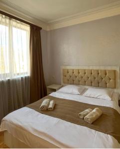 Letto o letti in una camera di Baron Hotel
