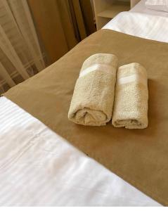 Letto o letti in una camera di Baron Hotel