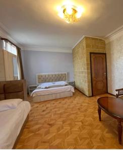 Letto o letti in una camera di Baron Hotel