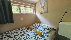 Postel nebo postele na pokoji v ubytování Maci-Ház + 13 fotografií