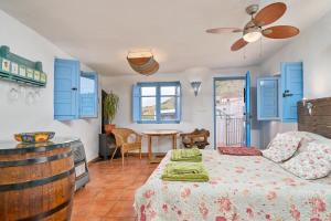 Postel nebo postele na pokoji v ubytování Cortijo Grande