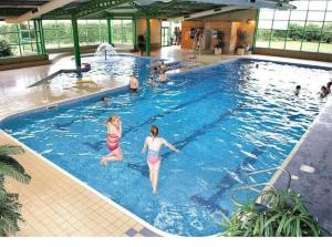 a group of people in a swimming pool at Westfield Getaway in Ulrome