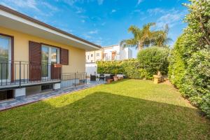Κήπος έξω από το Casa Vacanze Ohana