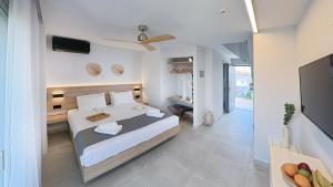 Katil atau katil-katil dalam bilik di Christina Sunshine Apartments +25 gambar