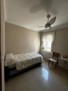 Ένα ή περισσότερα κρεβάτια σε δωμάτιο στο Velo de Flor Jerez Apartment