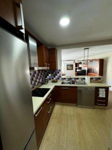 Η κουζίνα ή μικρή κουζίνα στο Velo de Flor Jerez Apartment