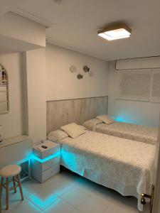 A bed or beds in a room at Residencial Vistamar