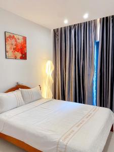 Ένα ή περισσότερα κρεβάτια σε δωμάτιο στο Happy home +12 φωτογραφίες