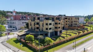 an aerial view of an apartment complex in a city at GRAND CENTRAL apartment with 3 bedrooms in Porec! in Poreč