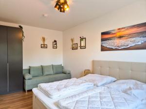 Postel nebo postele na pokoji v ubytování Ganz Frisch Ferienwohnung bis 6 Personen an der Nordsee