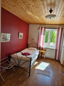 Postel nebo postele na pokoji v ubytování Hotell Hemgården