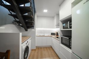 Kuchyň nebo kuchyňský kout v ubytování Apartamentos rurales La Alquería del Pilar