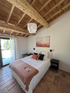 Postel nebo postele na pokoji v ubytování La Clé des Champs, Boutique hôtel & Spa - Le Mas de Garrigon