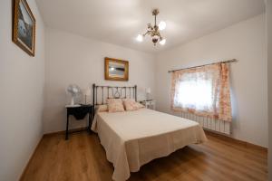 Postel nebo postele na pokoji v ubytování Apartamentos rurales La Alquería del Pilar