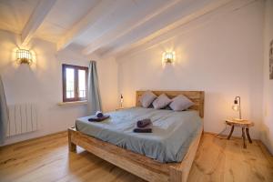 Postel nebo postele na pokoji v ubytování Petra Holiday Home by Rentallorca