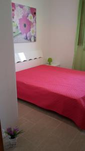 Postel nebo postele na pokoji v ubytování Casa Vacanza Sophie