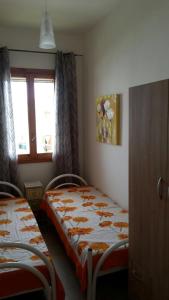 Postel nebo postele na pokoji v ubytování Casa Vacanza Sophie