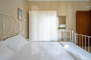 Letto o letti in una camera di Homiday - Via Michetti