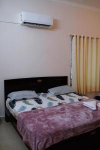 Ένα ή περισσότερα κρεβάτια σε δωμάτιο στο Ira Premium Service Apartments-Apollo