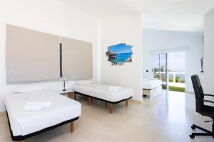 Posteľ alebo postele v izbe v ubytovaní Fantastic home with amazing sea views + 37 fotografií