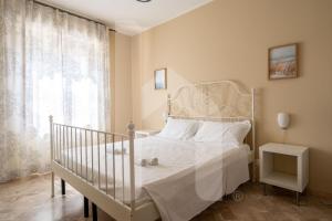 Letto o letti in una camera di Homiday - Via Michetti
