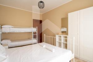 Letto o letti in una camera di Homiday - Via Michetti