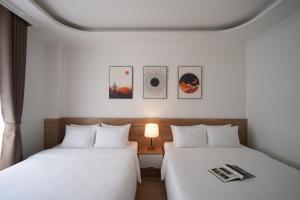 Postel nebo postele na pokoji v ubytování Nature Hotel + 34 fotografií