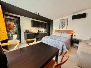 TV a/nebo společenská místnost v ubytování Memento B&B