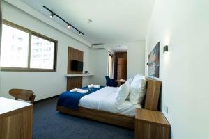 Mateus Hotel & Pool客房内的一张或多张床位