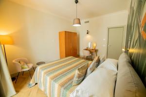 Postel nebo postele na pokoji v ubytování CASA del LAURO SUITE
