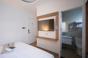Postel nebo postele na pokoji v ubytování Nature Hotel