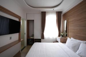 Postel nebo postele na pokoji v ubytování Nature Hotel