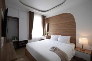 Postel nebo postele na pokoji v ubytování Nature Hotel