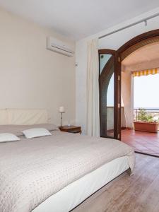 Ένα ή περισσότερα κρεβάτια σε δωμάτιο στο Villa Bologna
