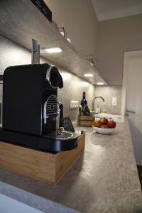 a coffee machine on a counter in a kitchen at Hof Lohmann in Verden