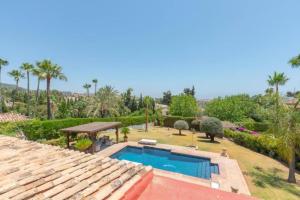 Bazén v ubytovaní Villa Casa Sol Encantadora villa con piscina alebo v jeho blízkosti