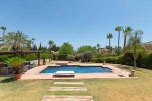 Bazén v ubytovaní Villa Casa Sol Encantadora villa con piscina alebo v jeho blízkosti