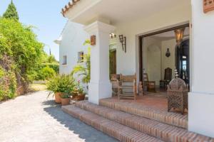 Vonkajšia záhrada v ubytovaní Villa Casa Sol Encantadora villa con piscina