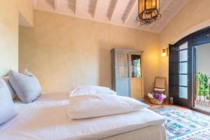 Posteľ alebo postele v izbe v ubytovaní Villa Casa Sol Encantadora villa con piscina