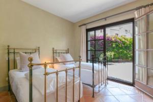 Posteľ alebo postele v izbe v ubytovaní Villa Casa Sol Encantadora villa con piscina