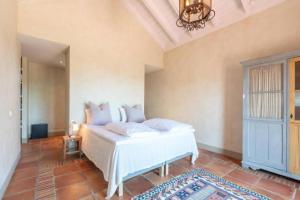 Posteľ alebo postele v izbe v ubytovaní Villa Casa Sol Encantadora villa con piscina