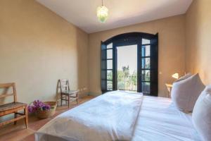 Posteľ alebo postele v izbe v ubytovaní Villa Casa Sol Encantadora villa con piscina