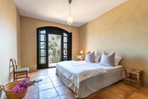Posteľ alebo postele v izbe v ubytovaní Villa Casa Sol Encantadora villa con piscina