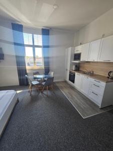 Kuchyň nebo kuchyňský kout v ubytování Best Boarding House
