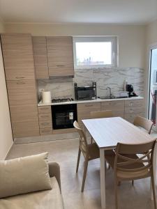 Kuchyň nebo kuchyňský kout v ubytování Appartamento Scilla centro + 17 fotografií