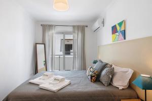 Postel nebo postele na pokoji v ubytování Apartamento Dourado Duplex