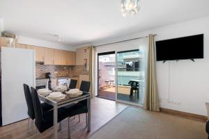 Kuchyň nebo kuchyňský kout v ubytování Apartamento Dourado Duplex + 12 fotografií
