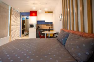 Una cama o camas en una habitación de Orbi Beach Tower