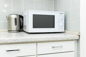 Kuchyň nebo kuchyňský kout v ubytování Probsteier Platz Meeresbrise