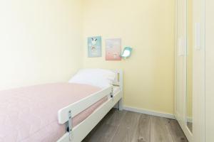 Postel nebo postele na pokoji v ubytování Probsteier Platz Meeresbrise